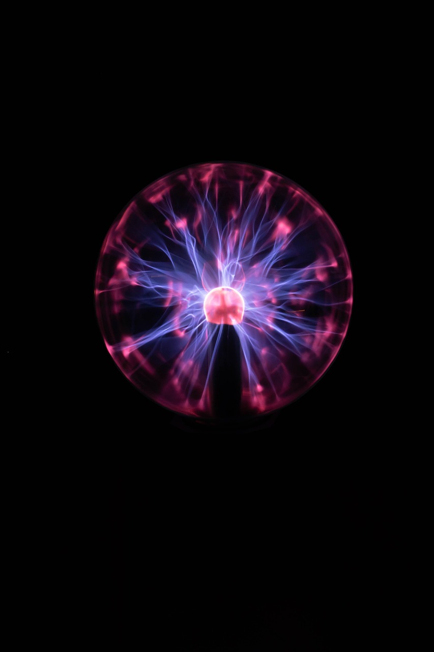 Electric plasma sphere with blue and pink energy arcs