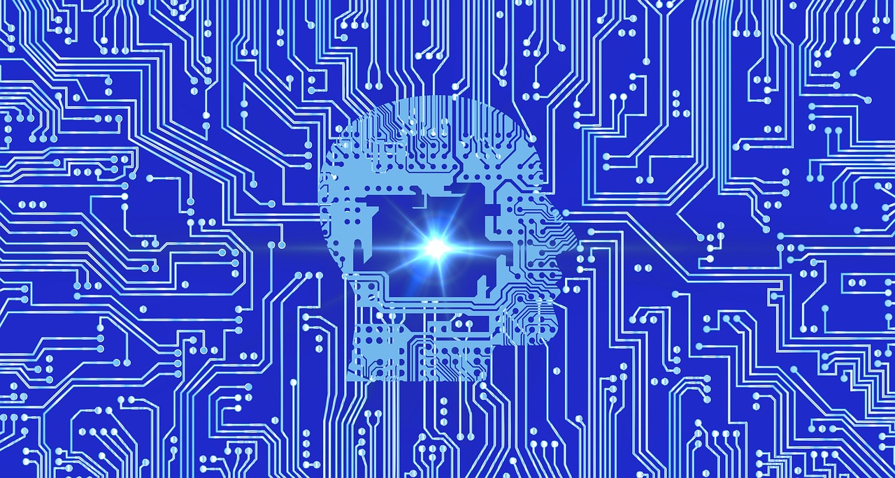 Circuit board illustration with glowing artificial intelligence head