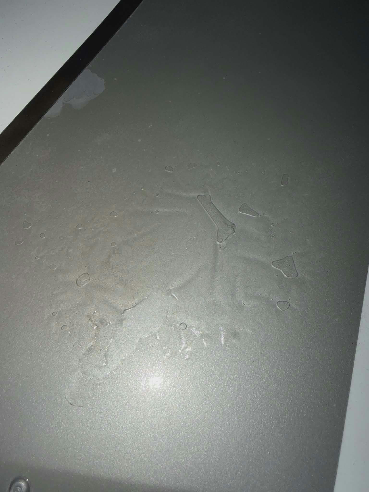 Finished aircraft paint surface with water beading . quality finish