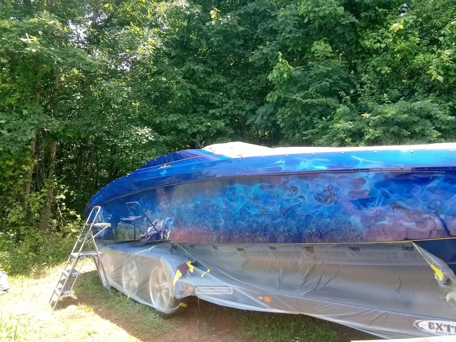 Speedboat after Finish Pro custom paint and marble flake finish